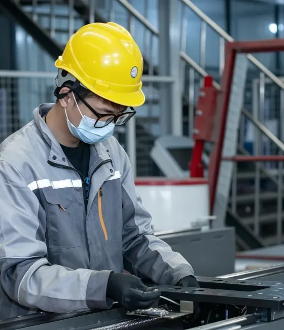 Workers are inspecting the machine